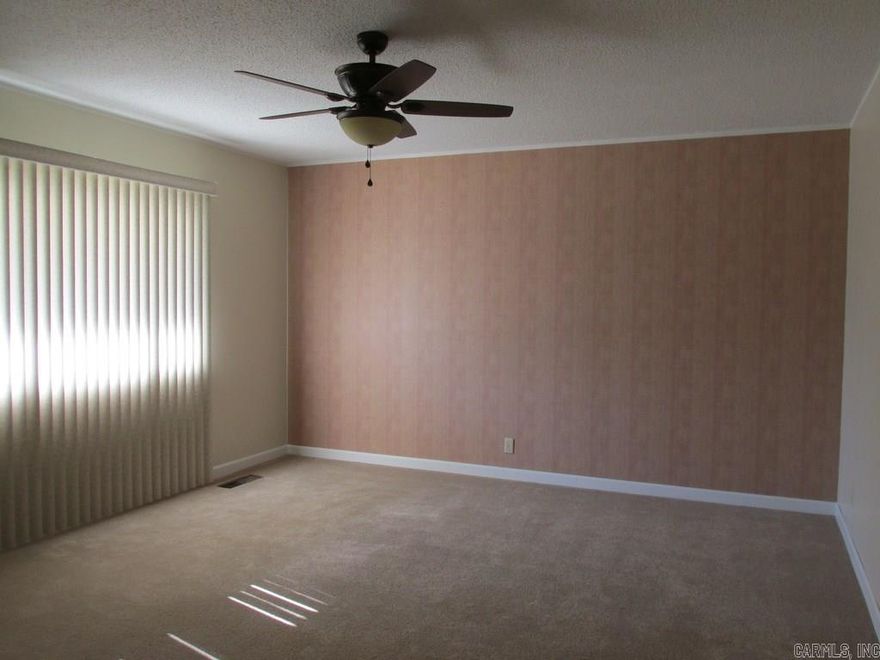 Great 3bd/1 ba home was totally remodeled!!! New windows, sub-floors, carpet, tile, ceiling fans, light fixtures, HVAC, whole house rewired, french drains, freshly landscaped and a new coat of paint! Move right in and enjoy! Natural gas heater in living room keeps you warm even if the power goes out! Features a one car garage with work shop and lots of storage in the back yard w/a paved drive all the way there. This is a must see, call to schedule an appointment today! Sq ft approx, please measure.