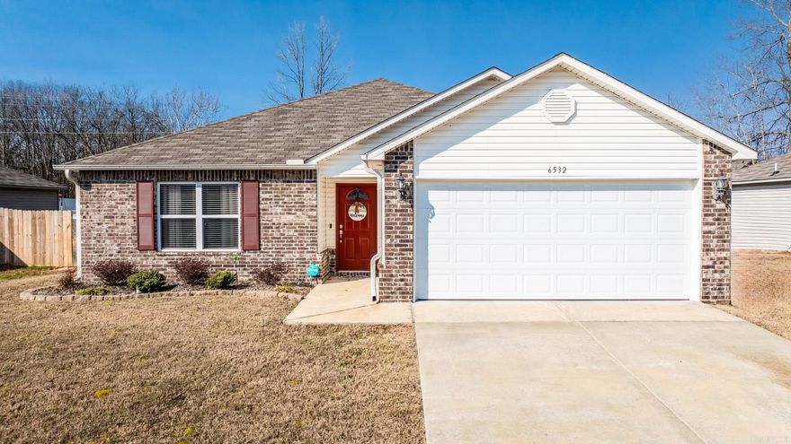 Step into this 2020-Built home in the Bryant School District and be captivated by its charm, from the Old Chicago style brick to the elegant red door. As you stroll along the sidewalk, you'll be greeted by a beautifully landscaped stone boundary garden bed. Prepare to be amazed as you open the stately front door and are greeted by the stunning floor that awaits you inside. The living room, just a few steps away, beckons you into the heart of the open floor plan, with its tall windows that flood the space with natural light. The modern lighting and ceiling fans add a touch of contemporary style that you'll love. The kitchen is a true highlight, with its rich countertops, stainless appliances, and ample cabinet space. The primary suite bedroom offers comfort and space, complete with a walk-in closet and a spacious bathroom. Two additional full-size bedrooms, a lovely bathroom, and a separate laundry room provide plenty of room and convenience. Outside, the fully-fenced, large backyard is a haven for families, offering endless opportunities for outdoor enjoyment.