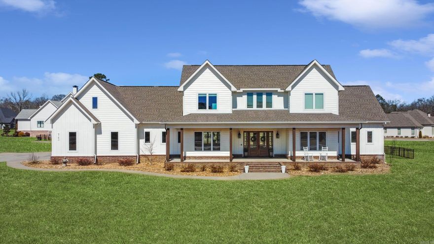 STUNNING CRAFTSMAN HOME ON 2.13 ACRES WITH A POOL AND IN GATED COMMUNITY! The experience begins with an expansive covered front porch that  welcomes you into a bright foyer and spacious living room with that has wood detailing, built-ins, and a cozy bench. The open kitchen features a large island, walk-in pantry, and a counter-to-ceiling window opening to the pool bar. Behind the kitchen you will find a unique butler’s prep area with wine station, sink, and ample room for small appliances, as well as a designated office with a built in desk! The main-level primary suite includes a double vanity, custom tile shower, soaking tub, and walk-in closet. A sunroom off the patio with wet bar and half bath is perfect for those pool parties. The main level also has a guest bedroom with en-suite bath, while upstairs offers additional bedrooms and two bonus areas. Enjoy the flat lot with covered back porch, saltwater pool, and fenced area!  Note: The lawn has been digitally enhanced for photography purposes to showcase its full potential.