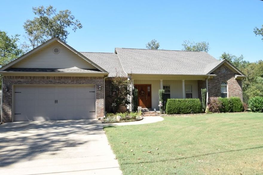 Absolutely beautiful custom built home in LSSD.  Gorgeous trim with abundant closet and storage space including a pull out drawer pantry in the stainless steel kitchen.  Large master suite with a very specious master bath.  Cozy log gas fireplace surrounded by elegant cabinets. Expansive 22 x 22 deck overlooking an immaculately groomed back yard with an incredible view. Great flow for entertaining and spotless throughout.  A country setting conveniently located approximately 10 minutes from the interstate.