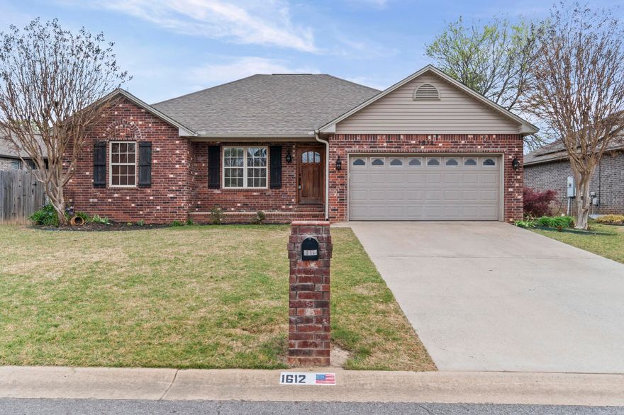 There's just something special about a home that's been loved from the very beginning and 1612 W Vine St is exactly that. This one-owner brick home has been well cared for since it was built in 2011, and it shows in every detail. With 1,526 square feet, the layout feels comfortable, practical, and easy to live in.  The ceramic tile flooring throughout the living room and bedrooms adds a clean, cozy touch while keeping maintenance simple. The kitchen offers a pantry for extra storage. The appliances in kitchen are about 3 years old and the refrigerator stays! New light fixtures added and new paint in 2022.  Out back is where this home really shines... a beautiful, fenced yard with a covered patio (added in 2013) that’s perfect for slow mornings, evening cookouts, or simply enjoying a little quiet time. Plus, you have the view of stunning trees and landscaping. The HVAC is just 5 years old with a second return vent added, and the 2-car garage gives you the space you need for everyday life. Sitting right in Searcy, you’re close to schools, shopping, and everything that makes life convenient because location really does matter. 1612 W. Vine is a MUST SEE! Recent appraisal was done!