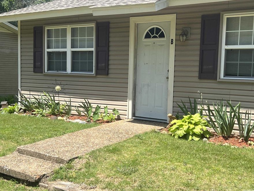 2 bedroom 1 bathroom duplex. new paint, yard/landscaping provided refrigerator provided