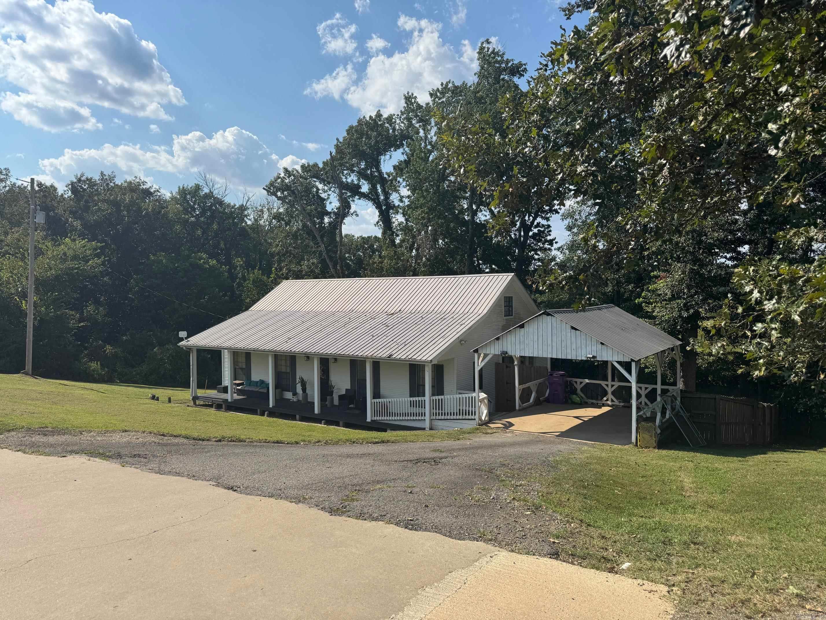 Large 4-bedroom home with a nice country feel but close to the city.