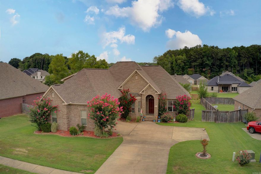 This home is move in ready! This home is located in a quiet neighborhood with gorgeous hardwood floors throughout the main areas of the home, a breakfast nook off the kitchen that includes beautiful stained cabinets, a dinning room, bonus room, 3 bedrooms and 2 bathrooms with a split floorpan. The backyard is large with a covered back porch, large concrete patio and the playhouse does convey with the property. Book your showings today and fall in love with this home!