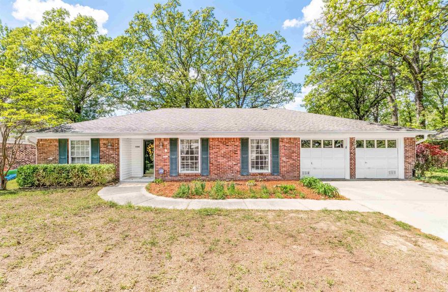 Discover this amazing split floorplan home with two primary suites, on one level. The inviting den includes a cozy fireplace and large windows to enjoy the view of the outdoor patio, for added entertaining space. The backyard features a storage building, an electrically-equipped workshop, and a new wooden privacy fence. A concrete pad offers ample parking for an RV or boat, with multiple access points and double gates. A spacious family/dining area and eat-in kitchen with a built-in buffet enhance this inviting home. Located close to the lake and convenient access to schools, shopping, and medical care. Schedule your private showing today and call this one HOME. **Please read agent remarks**