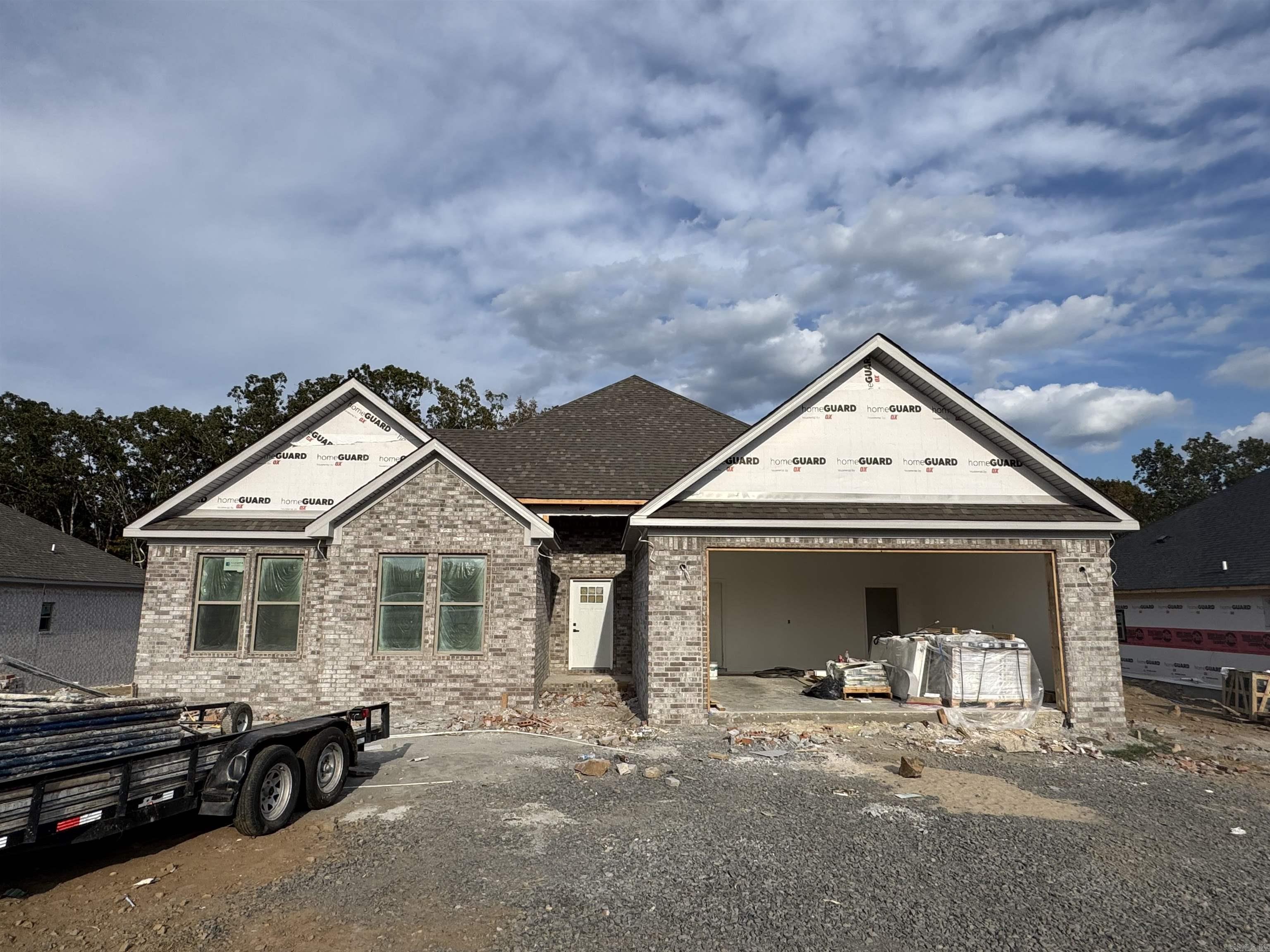 Welcome to this 2025 New Construction home that will be ready for you soon! The home is a 4-Bed, 2-Bath Split Floorplan w/an Open Concept. The Living Room and Kitchen are centrally located toward the back of the home w/a fantastic front foyer. The home also boasts an amazing pantry. The master bed, bath and closet is amazing! The closet is enormous! The home is an ideal location only 2-3 min from I57/67/167 and the new Pre K complex for Cabot Schools. Once the new road connects this property will also be a short trip to Gametime at the Grounds too! Presently, the property is a short 8-10 min drive to Greystones Golf Course as well! Interested in an upgrade or concessions? Let's discuss and see what we can make happen! Painting underway now, interior progress photos to follow soon! See Agent Remarks.