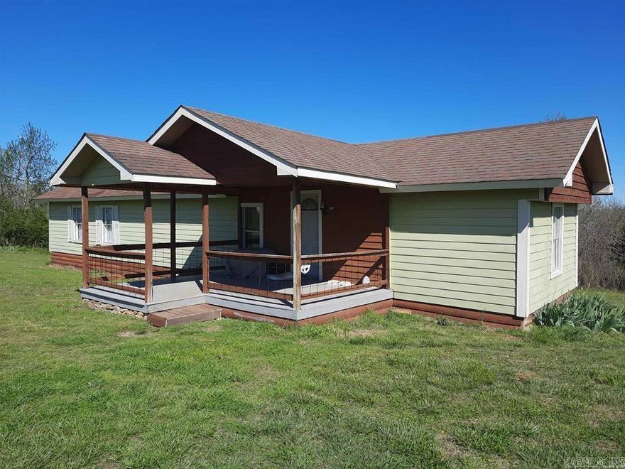 Check out the view from the front porch. You can sit out on the porch with your coffee in the morning! This is a great fixer-upper for a first time home buyer property or would make a great income producing property,. The kitchen area has been completely remodeled.