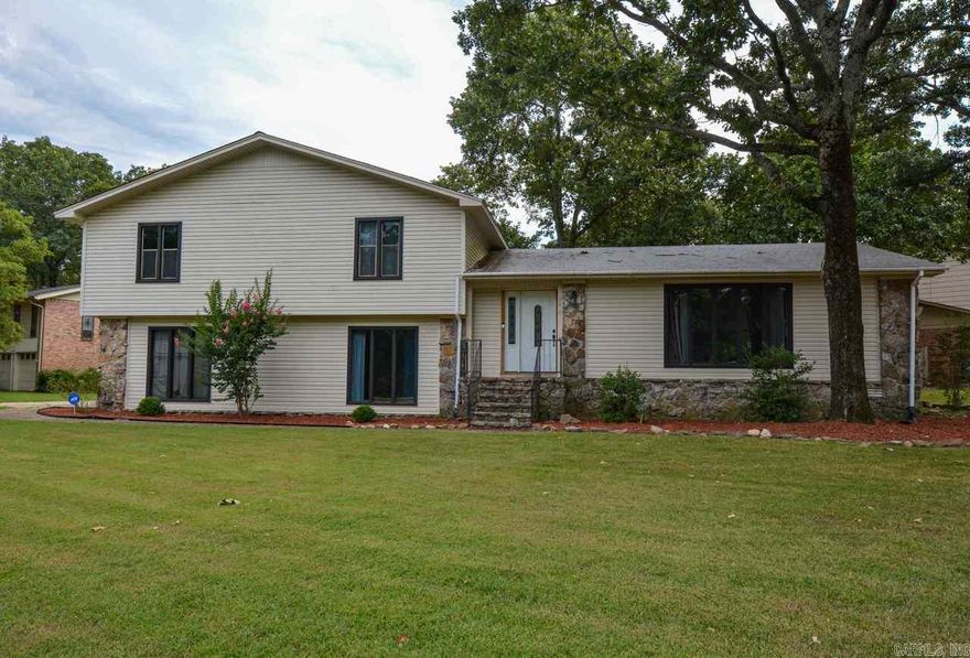 This home offers 5 bedrooms, lots of space for everyone, plus a 3 car garage-all on a huge corner lot. Beautiful open floorplan, wood floors, lots of updates, 2 living areas, and private backyard. Custom built-ins in living room and custom coffee bar in dining area. Downstairs guest bedroom makes a perfect in-law or teen-quarters with access to half bath and laundry room. Perfect location to schools, shopping, restaurants, & freeway access. Great area amenities close to Overbrook pool, tennis, & playground.