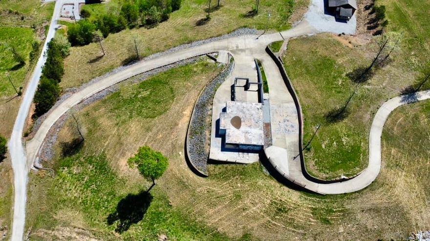 3.12 Acres M/L with a poured concrete driveway and rock retainer wall. This was a homestead place and the home that was on it burned and had to be cleaned up. There are some concrete walls still standing but would need to be removed to rebuild. This property has views for miles as the photo shows. Please call to ask any questions you may have.