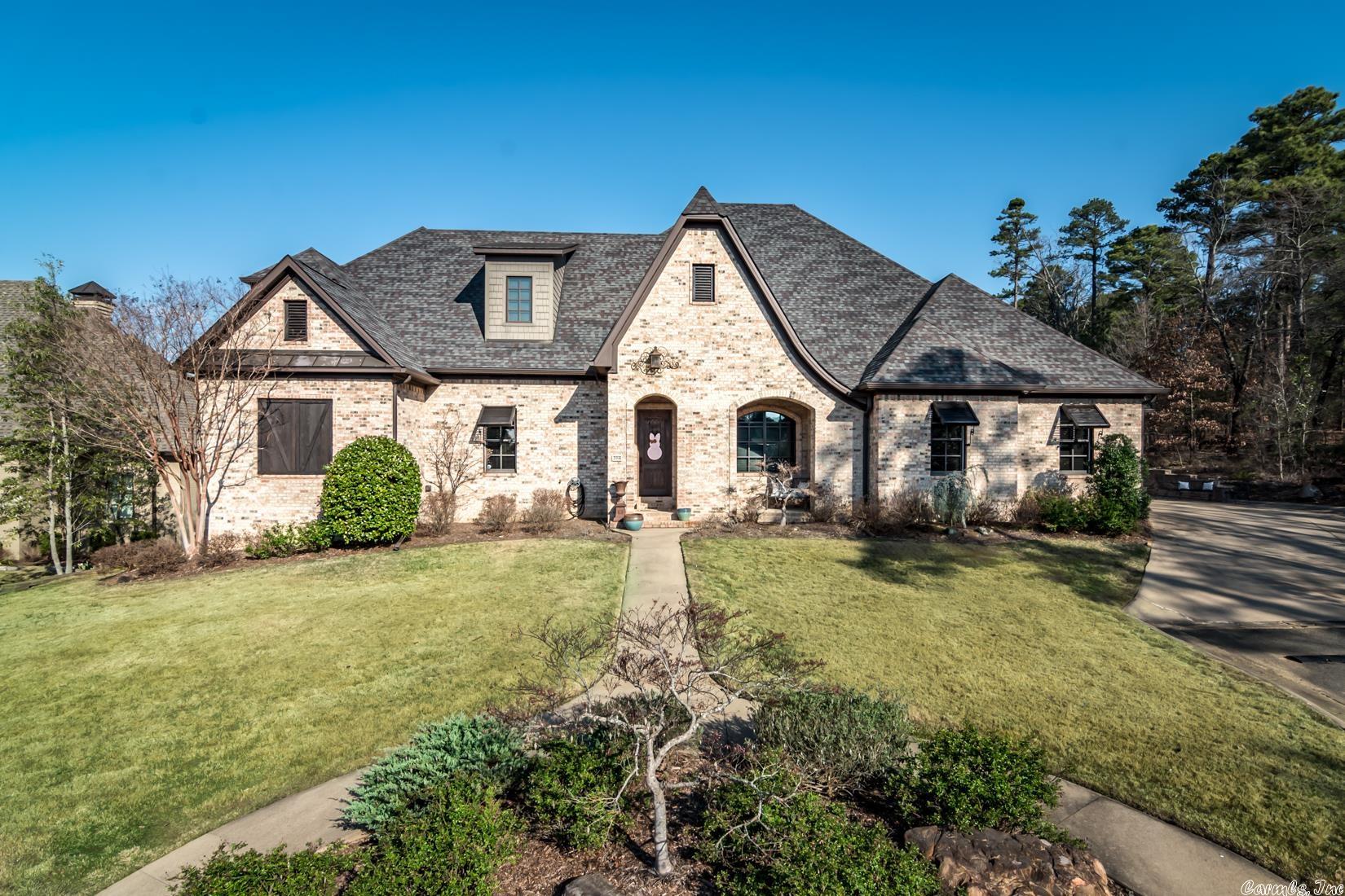 This stunning residence is in the sought-after Arbors gated community, tucked away at the end of a cul-de-sac. It provides an ideal haven for those seeking a peaceful lifestyle while also being within easy reach of various amenities such as shopping, top-rated restaurants, scenic walking trails, and a renowned golf course just minutes away. The property boasts a spacious kitchen with everything a true culinary enthusiast could desire, including double ovens, a large gas cooktop, an ice machine, and exquisite countertops. Enjoy the bar overlooking the expansive great room, perfect for entertaining guests. Unwind in the luxurious primary suite featuring beautiful hardwood floors and a Primary bathroom with double closets with a soaker tub and a double-entry shower. The upstairs bedrooms offer a private den, an additional washer/dryer, and walk-in attic storage with a 2nd stair access to the garage. Other noteworthy features include a Sonic ice machine, a three-car garage, storm shelter, home generator, and epoxy flooring in the garage. Don't miss this incredible opportunity - schedule a showing today! Please refer to the agent's remarks for further details.