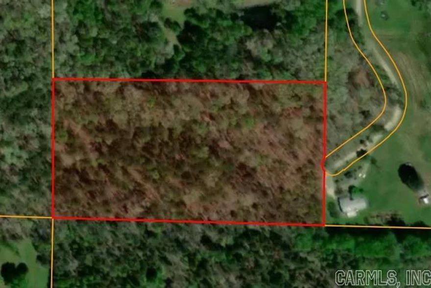 Beautifully wooded property.  No Utilities or road frontage.