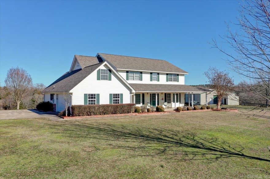 Motives seller, make offer.  Property is ready to welcome its next family, offering ample space for growth and a variety of features, including gardening areas, a workshop, and even the possibility of adding a pool. The opportunities are limitless. Enjoy breathtaking views of the Ouachita National Forest from this 9.2 acre lot, which includes a 40x60 metal shop featuring a workroom, bolted steel beams, and 8' heated flooring with two roll-up doors. Key features include: Two 160' wells (both plumbed to the house: one for outdoor use and the other dedicated to the house) Located less than 1/8 mile from the Ouachita River that runs behind the home, 2 50-gallon water heaters, new microwave and oven, roof-2024, along with new bath cabinets and lighting, two electric panels and 24' of fiberglass insulation, 6' walls and two new Carrier HVAC units (2 and 2.5 tons), creek that borders the national forest and Muddy Refuge, sunken family room featuring an Extraordinaire positive pressure wood-burning fireplace (with air intake from outside).  The avg electric bill is $260 month. The home sits on a knoll, providing stunning views from every angle, surrounded by wooded and cleared areas.