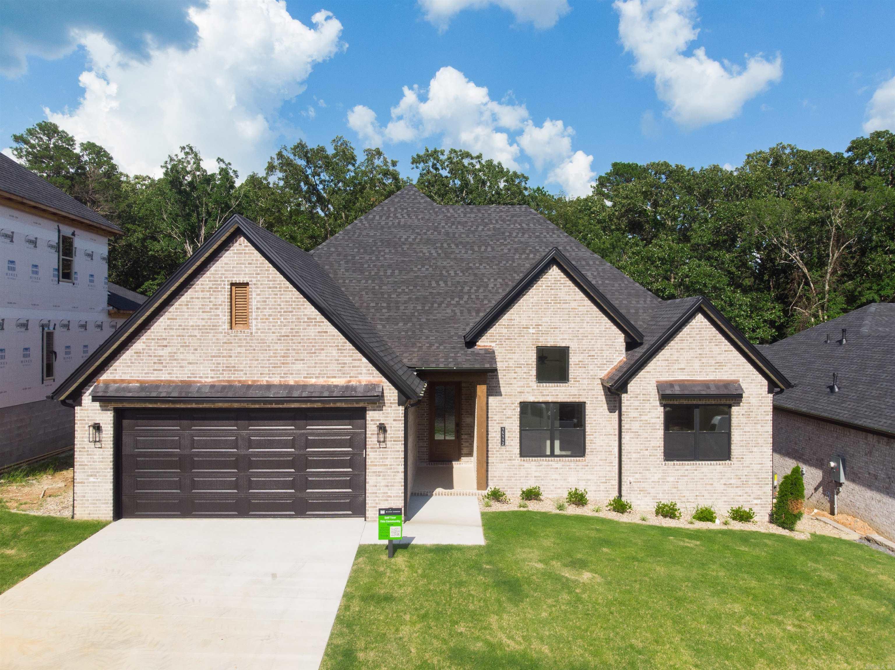 This move in ready home is located in the desirable Phase 2 of Stonebrook. Stonebrook was Voted AY Magazines Best Neighborhood in Central Arkansas! Enjoy gated privacy, scenic walking trails, a private lake, and community amenities in one of the most sought-after neighborhoods in Maumelle! Welcome to 15112 Matterhorn—a charming, single-level brick home featuring 2,491 sq. ft. of beautifully designed living space with 4 spacious bedrooms and 3 bathrooms. This home offers a seamless blend of comfort and style, perfect for family living or entertaining. The covered back porch invites you to enjoy outdoor gatherings or peaceful relaxation, while the surrounding green space adds a touch of natural beauty. This property combines quality craftsmanship with thoughtful details for an ideal retreat. Schedule a self guided tour on the Hines Homes website.