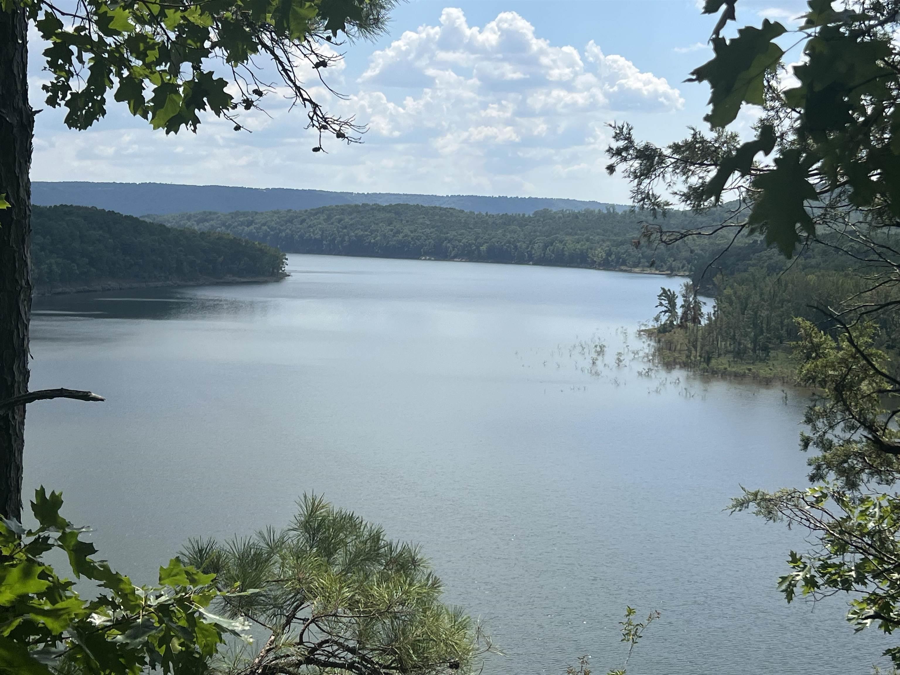 If you want to enjoy the true beauty of nature this 3.25 acres is the perfect place to build your dream home. imagine sitting on your back deck every morning or relaxing every evening after work enjoying the tranquility of Greers Ferry Lake. Nothing better for the body, mind, and soul than this view. If you want more than 3.25 acres of view you can purchase 3 more 3.25 acre tracts for a total of 13 acres. Don't miss out on this rare opportunity.