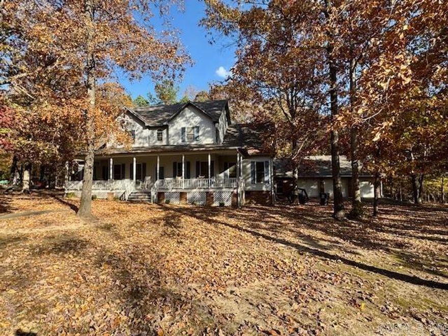 4172 SQ FT HOME ON .83 ACRE!  This gorgeous 5br/3.5ba home has so much to offer! Just a few highlights are quiet, friendly neighborhood, great location close to schools, downtown, churches, medical community and so much more.  Spacious two-story layout with an elegant design, open floor plan, high ceilings, lg windows. The four bedrooms (plus bonus room) and 3.5 baths provide plenty of space for a growing family.  Well organized, efficient kitchen layout with spacious cabinet space, breakfast and formal dining areas. Large, separate utility room with ample storage space. The large family gathering room features beautiful brick fireplace and French doors with serene view of wooded area.  The spacious, multi-use room can be used for office/study or recreation. Charming wrap-around porch, ample lower and upper decks, 3 bay garage w/storage and private driveway to accommodate multi vehicles.  New central heat/air installed March 2025, storage spaces galore, Clay County Connect fiber optic internet service available.  These are just a few amenities offered with this beautiful home.  "Warranties transferring with the home include garage foundation work, termite contract and 2025 C/H/A."