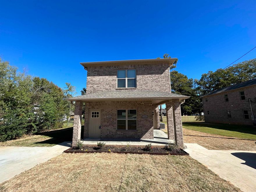 BRAND NEW DUPLEX convenient to all the best Central Arkansas has to offer! Just over 2 miles to Little Rock Air Force Base and fifteen minutes from downtown Little Rock! FULL 3 bedroom/2 bath, one downstairs and one up. Eight (upstairs) and nine (downstairs) foot ceilings with a full brick exterior. Each floor has waterproof vinyl flooring throughout and a full laundry room. Granite countertops! Walk down the hall to the two bedrooms with ample closet space. Primary bedroom at the very back of the building with its own large closets and bathroom. Construction is COMPLETED!  This is one of two duplexes in a row for sale. This is the Left building.