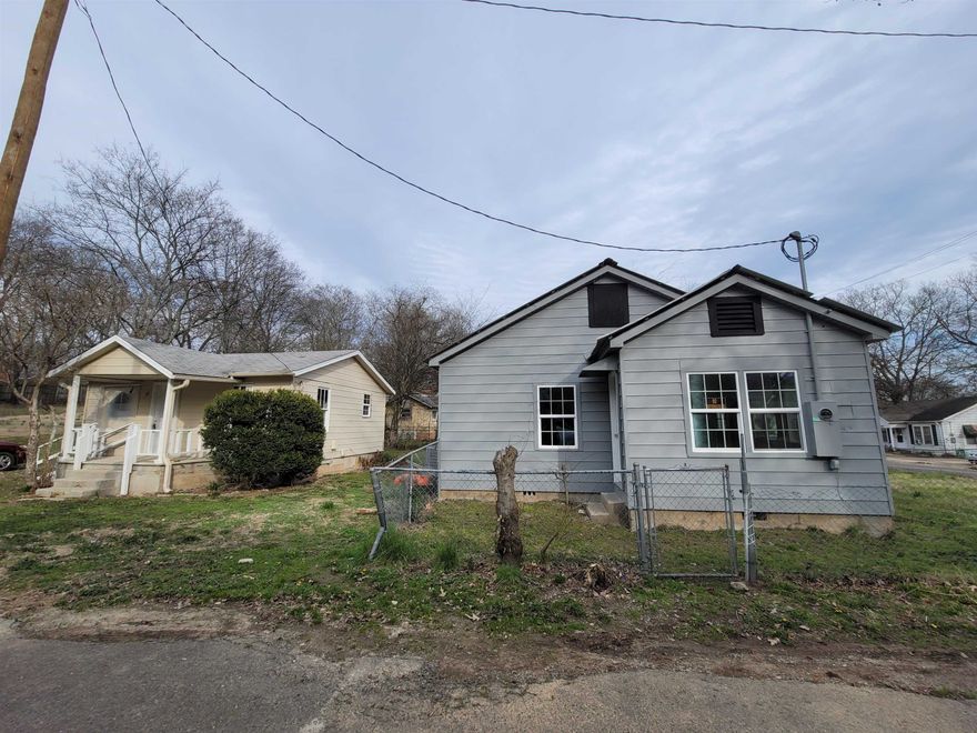 2 houses for 1 Price! Investors should take a look at these 2 works in progress. Front house has had some electrical, HVAC, windows and framing work done, just finish this one out to your own specs! The back cottage has been cleared out and is just waiting for someone to bring this 1/1 back to life. Maybe you need an additional house for extended family or you just want to maximize your monthly rents, either way, these houses have some great bones to build upon. Easy to show. Make an offer!