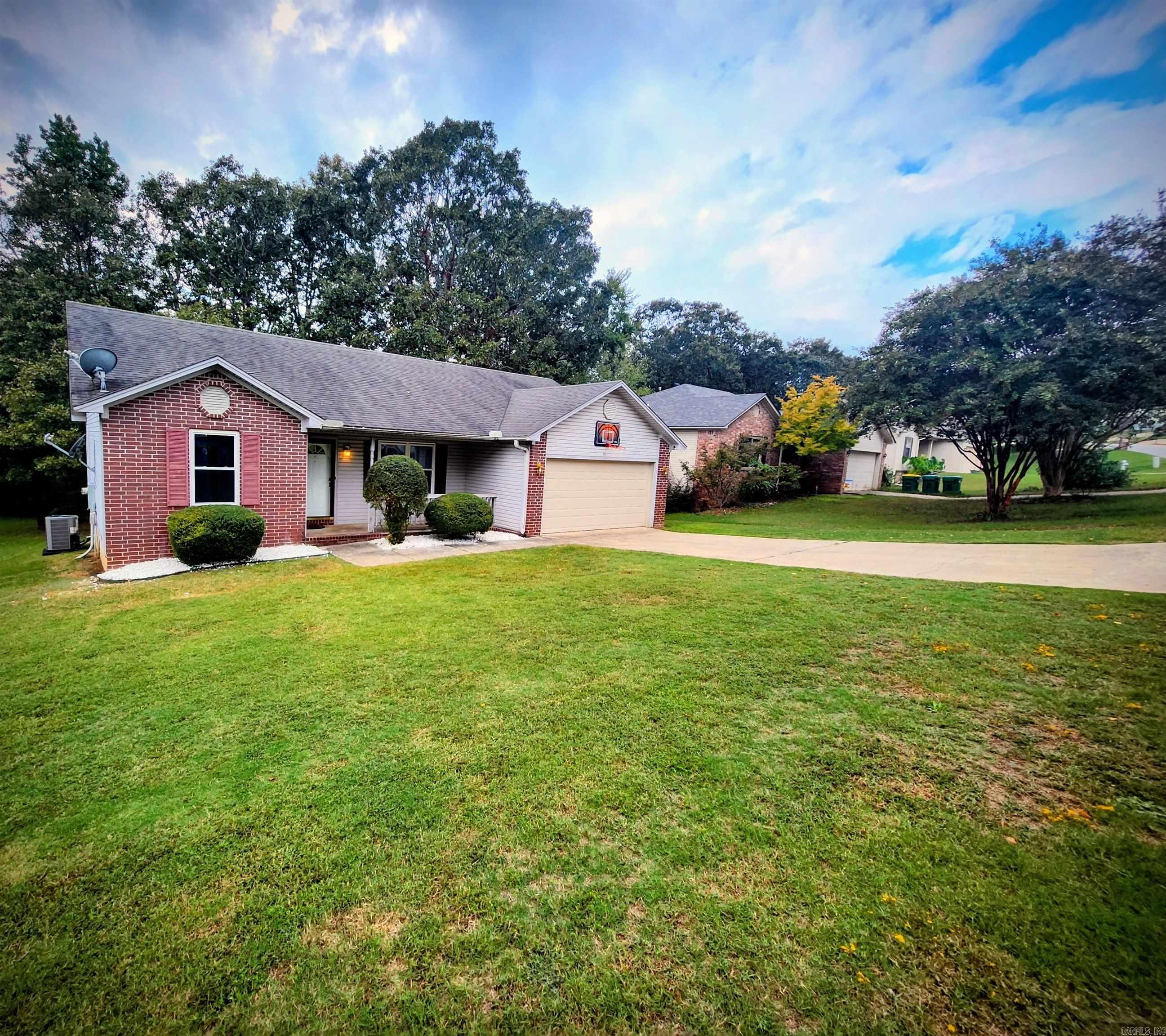 The search stops here!! This 3bd, 2BA sits on .22 acres located near the Airforce Base. It's floor plan is open & split. The high vaulted ceilings truly makes the great room Great! It's 2 Car Garage is Oversized.. The newer hardware, lighting fixtures & carpet & water heater makes this home turn key ready!! NEW HVAC 2025. Enjoy your morning coffee in peace on the deck overlooking the sylvan setting. Don't miss your opportunity to call this beauty home as it will not last long!! 100% Financing Offer by Rural Development ****Agents see remarks****
