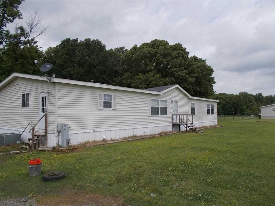 Sold before listed. Beautiful double wide, brand new roof installed also new stove. Den with wood burning fireplace, large kitchen with breakfast bar, plus a HUGE bonus room for media room or craft room.