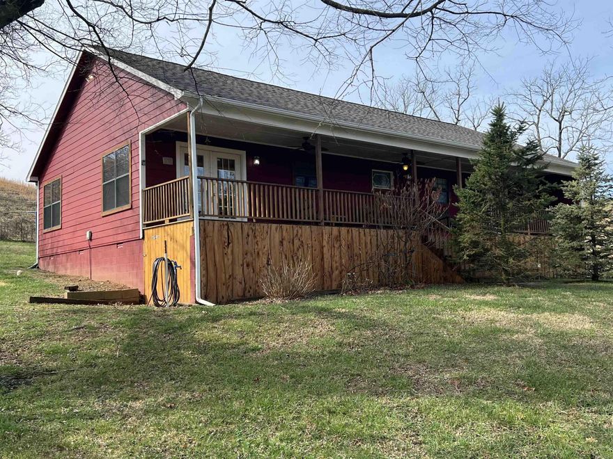 Two Homes near Boxley Valley and the Buffalo National River!!! 3BR-2BA home on 1.56 acres plus a 2BR-2BA mobile with 960 sqft!! The 1,456 sqft main house includes a 8 x 51 covered front porch and 7.5 x 21 covered back porch, handicap accessibility, wood fireplace, two walk-in closets, new roofs in 2022 on both homes. The 2019 mobile is on a permanent foundation with a separate water meter and septic. Property includes rural water, car carport, 20x20 covered sitting area, 10x12 storage building, and a 10x16 storage building with covered porch that is wired for electric, and fruit trees. On paved road only 5 miles from the historic Boxley Valley church and only 1/4 mile from the National Forest! The homes come fully furnished and are used as nightly rentals currently.