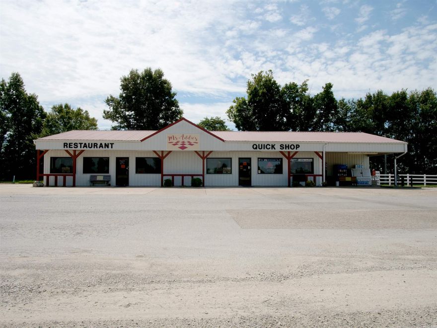 Rare commercial opportunity. The iconic Ms. Addie's Quick Shop & Restaurant, a long standing destination for fuel, food, and community connection since the 1940s. This highly visible 2.48 acre property offers over 800 feet of highway frontage with strong daily traffic counts and exceptional accessibility. Known for its welcoming atmosphere, friendly staff, and popular home cooked meals, the business has built lasting community ties and a loyal customer base throughout the region. The site includes a convenience store, gas station, 60 seat restaurant, commercial kitchen, walk in beer cooler, office space, and covered vending area. Hard surface and aggregate parking areas total approximately 1.58 acres, providing ample space for customer traffic, large vehicles, and future operational flexibility. Strategically located just minutes from Crowley's Ridge State Park and Lake Frierson State Park, this property also benefits from being the only gas station between Paragould and Walnut Ridge. Exceptional opportunity for investors or owner operators seeking a versatile commercial property with established business presence, regional recognition, and long standing success.