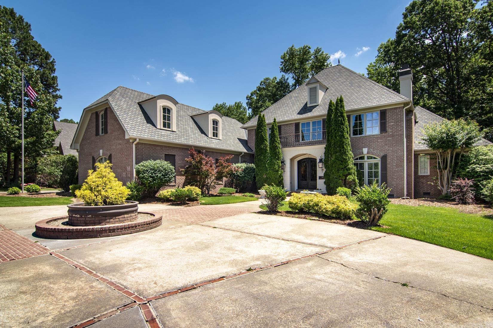 Exceptional Custom Home by Carl Gray Hinson in Prestigious Sologne Nestled on a beautifully landscaped, three-quarter-acre corner lot, this outstanding custom home is located in Sologneāone of Chenalās most sought-after neighborhoods. Backing up to protected greenspace, this residence offers privacy, elegance, and timeless architectural design. The gracious main level features two spacious living areas, a formal dining room, and an eat-in kitchen perfect for entertaining or casual gatherings. The luxurious owner's suite is a true retreat, complete with a spa-like bath for ultimate relaxation. Upstairs, youāll find three generously sized bedrooms, a large recreation room, and a versatile bonus room ideal for a home office, gym, or hobby space. Enjoy serene views from the wonderful, covered porch that overlooks the lush greenspace, offering a tranquil outdoor living experience. Additional highlights include a three-car garage with extra storage space and meticulous landscaping throughout the property. Opportunities to own a home of this caliber in Sologne at this price point are rareādonāt miss your chance to make it yours.