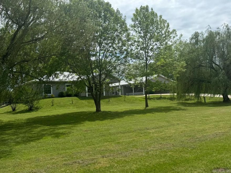 Rollin, Rollin, Rollin on the River! What a beauty, 3 Bedroom Home, 2 private boat docks, 933sq ft. 1 Bed/1 Bath apartment, Large 30x60 insulated metal shop with electricty, huge carpot & extra parking space. This is a private paradise on the AR River/Lake Landhoffer. Views are extrodinary. Surrounded by farmland and the best neighbors around. Home is 3 bedrooms, 2.5 baths, granite counter tops throughout. Kitchen boasts of SS appliances, gas stove and cozy fireplace for cool nights. The apartment is large with open floor plan offering 1 bath & 1 bedroom & storage area. Can be used to host the parties, too.Back porch is  1/2 covered & 1/2 open and runs length of house to host those BBQ's or just sit there and enjoy the peace & tranquality. Documents are online. About 20 minute to surrounding areas, shopping, golf, entertainment etc. LR Downtown is 20-30 minutes. Shop on one side and apartment on the other so no immediate neighbors. 10' eastment on apartment side as well which is farmed each summer. This propert offers everything, beauty, comfort, storage, hobby area, guest areas and the uniqueness of Arkansas on the water. Sq Ft. appraisal 2023