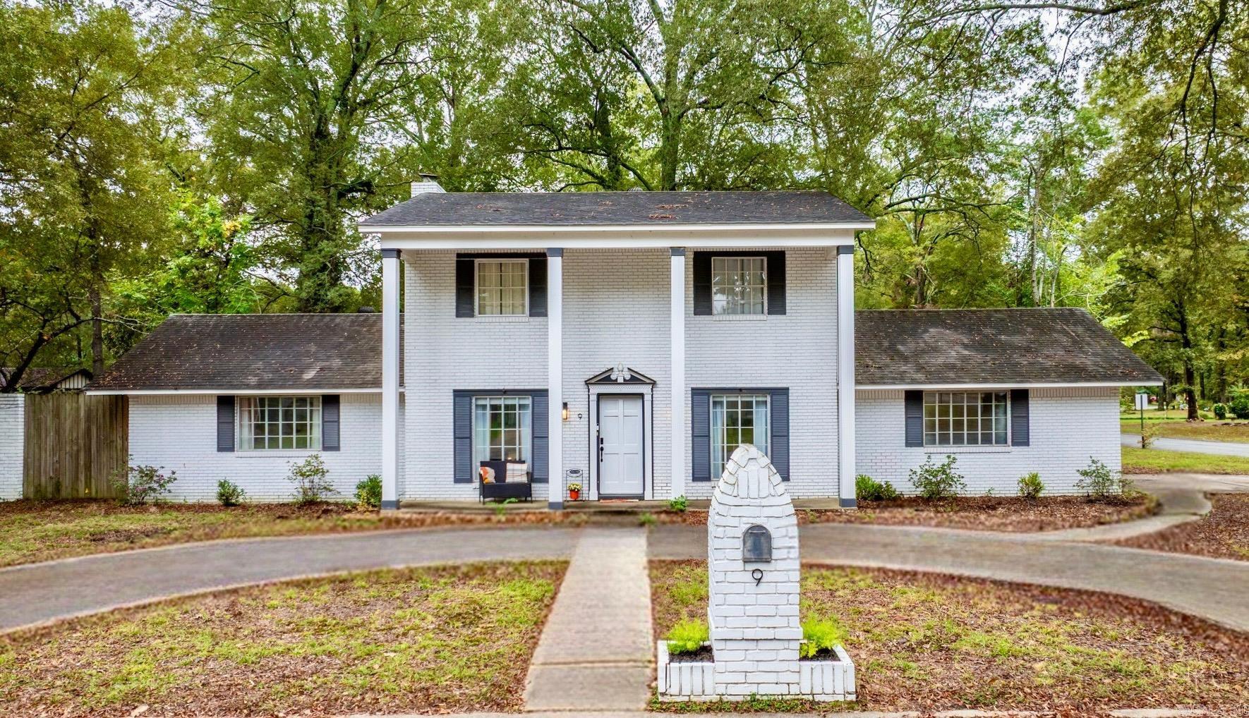 Beautifully remodeled and move-in ready, this 4-bedroom, 2.5-bath home on Smoking Oaks Road offers the perfect balance of comfort, charm, and modern updates. Nestled in a quiet, established neighborhood surrounded by mature trees, the home welcomes you with excellent colonial-style curb appeal w/ a circle drive. Inside, youāll find a spacious living area with luxury vinyl floors and custom touches throughout. The kitchen shines with granite countertops, light/bright cabinets, stylish tile backsplash and stainless steel appliances. The primary suite includes a fireplace, walk-in tile shower, and relaxing soaker tub, your own private retreat! Additional highlights include new lighting, barn door accents, fresh paint, and a storm cellar for peace of mind. Step outside to a fenced backyard ideal for entertaining, gardening, or play. Conveniently located near schools, shopping, and I-40 access - this home truly checks every box for comfort, style, and convenience in Conway. Schedule your showing today!