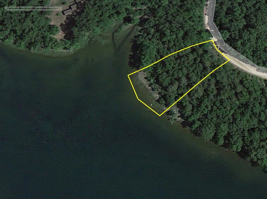 Must-see lake lot overlooking Rainbow Lake in Hardy, Arkansas. This lot is in a prime location near the downtown area of Hardy. Enjoy private lake life on a hilltop while also taking advantage of town amenities. This lot allows you access to two private lakes and private recreation areas. You can also enjoy shopping, camping, parks, and river access in town. Come see this lot and pick out the building spot for your home or cabin on the lake.