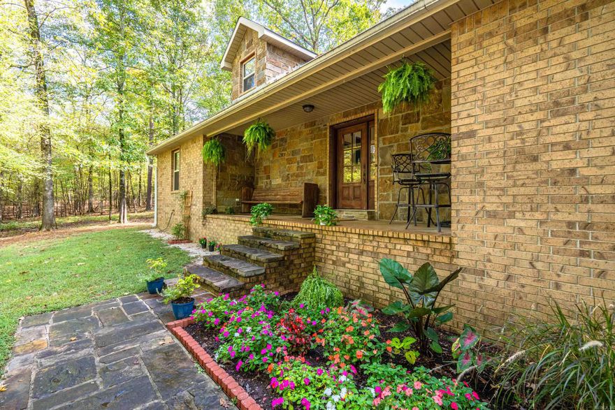 Make your appointment now to see this home! 9.5 ACRES!!!!!!  So many amazing perks! This beautiful, well maintained brick home is located on a hilltop in the sought after gated Riverview Estates. Things like a zoned hvac unit and all new kitchen appliances will give you the peace of mind you want. With 2.5 garages on the main house, parking is a breeze! Flagstone flowerbeds make for fun for those w/ a green thumb. Vaulted ceilings welcome you into great room that offers a stone, wb fireplace w/ wood storage from outside & great views. The well appointed kitchen w/ granite over looks the great room & dinning area that accommodates a large dinning table which is essential entertaining! Natural wood floors in all rooms but the tiled baths. While the 1/2 bath & large primary suite are on the main level, upstairs offers a second family room, laundry chute, full bath & two large bedrooms. Outside offers a new deck & fenced yard (around 1.5 acres), RV hookup, greenhouse, large air conditioned shop piped for compressed air, tall overhead door & office/bonus/living quarters/full bath and a loft!! The shop is set up for a wood stove and has a wood door to the outside for convenience.