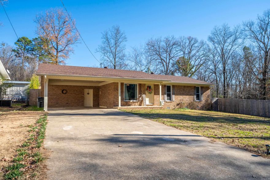 This House is priced to sell! This is a city home with the feel of being in the country. It is located at the end of a quiet street and is situated on 2 large lots. This 3 Bedroom 2 Bath home will not disappoint. It has a newer roof and HVAC unit, updated windows, floors, counter tops, and cabinets. Outside is a large fenced in yard with lots of privacy. It also features a storage building and a fire pit. There is another driveway that leads to the back of the house that has a concrete slab ready for a carport or garage. Schedule your showing today!