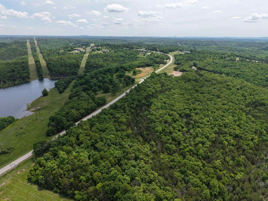 This 5-acre tract offers the perfect blend of location, versatility, and opportunity. With prime highway frontage and no restrictions, this property is ideal for development, building your dream home, or creating a private getaway. Situated less than a mile from the world-famous Norfork River and just minutes from Lake Norfork and a public boat ramp, this land provides easy access to some of the best fishing and boating in the Ozarks, making it an even more desirable area for recreational use. This property is even located near the popular Whispering Woods restaurant. Whether you're looking for a recreational retreat or a site for a cabin or vacation rental, this property has it all. Additional acreage is also available for purchase. Don’t miss this rare opportunity for only $39,900— the possibilities are endless! Contact us today to schedule a showing!