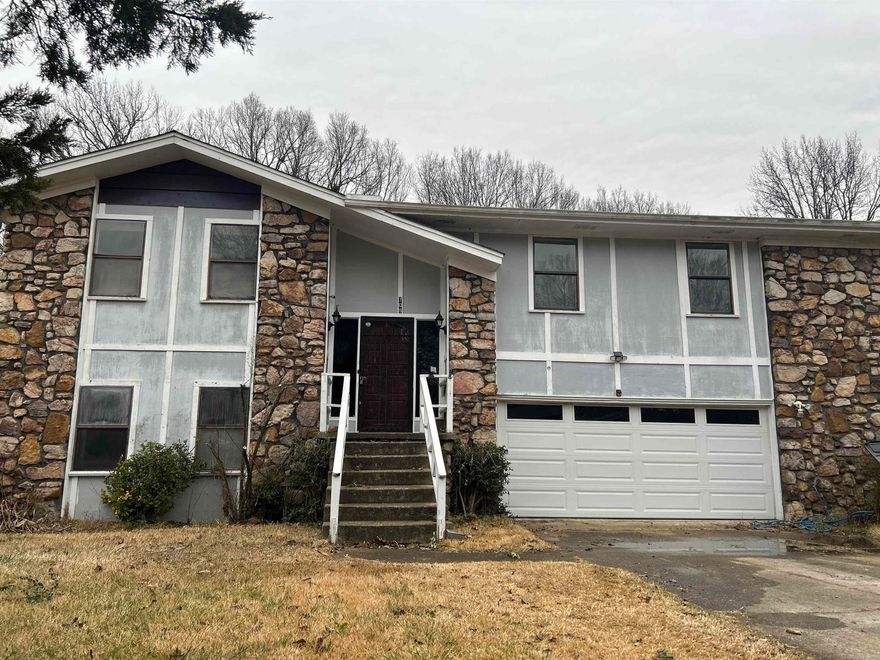 This house is such a great space buy! Yes it needs some work.   Split level house, vaulted ceilings in livingroom, den would be a great hangout spot to watch movies or your favorite sport on tv.   Oversized partially covered deck, fenced backyard. Original features throughout. SELLING "AS-IS ONLY"