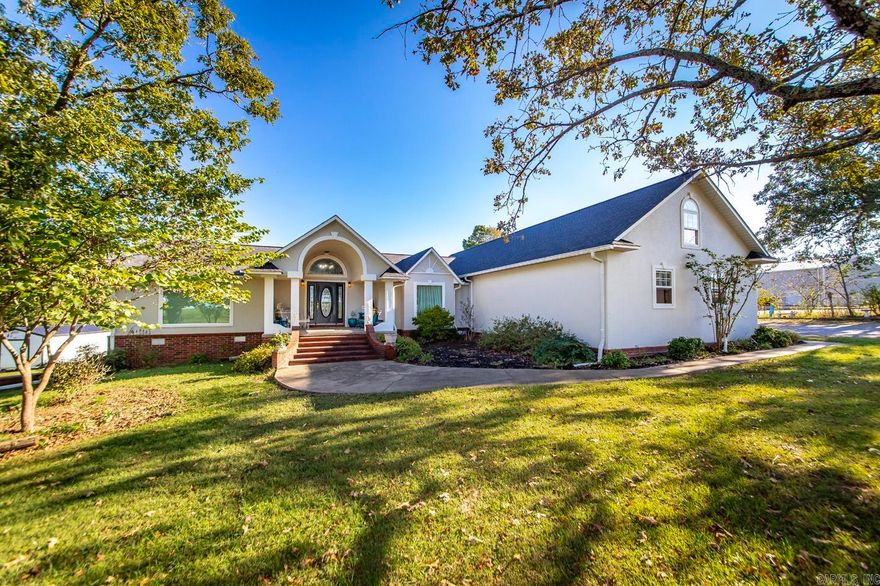 Very meticulously kept home in the country.  This is a must see! From the stucco exterior to the granite countertops in the kitchen, custom crown molding and trim throughout there was no expense spared on this gorgeous home.  Stunning features throughout this well-built custom home.  The downstairs has its own entrance and could have the potential for a rental or in law suite.  Kitchen, living area, two bedrooms and a bath are all located in the downstairs living area.