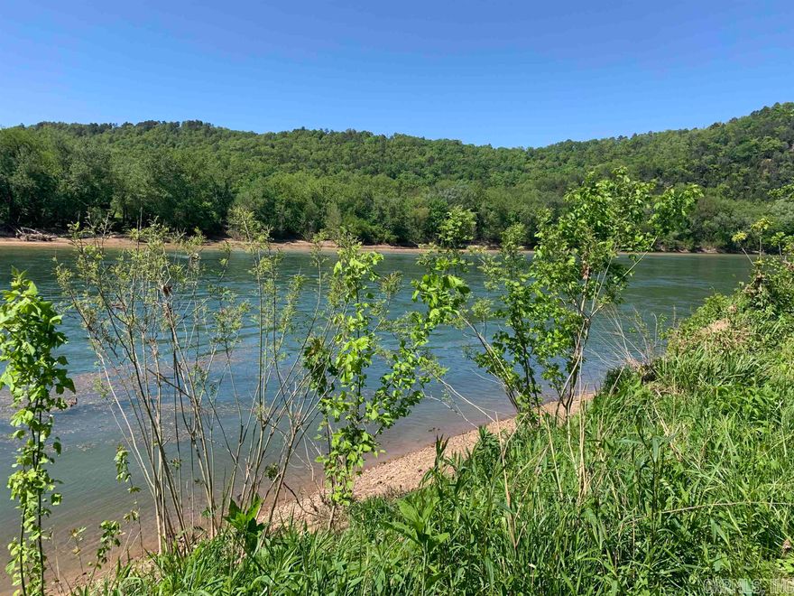 Beautiful riverfront resident lot located just minutes from the music, eateries, and shopping of Mountain View! This gorgeous lot in a great neighborhood offers just under an acre and is conveniently located next to the Arkansas Game and Fish's public access and boat ramp. This is one of the best areas for fishing on the White as it is regularly stocked by AG&F. This lot is ready to go with public water and electric onsite, and fiber optic internet availability. The Bill of Assurances and Covenants ensures the area remains safe and desirable.