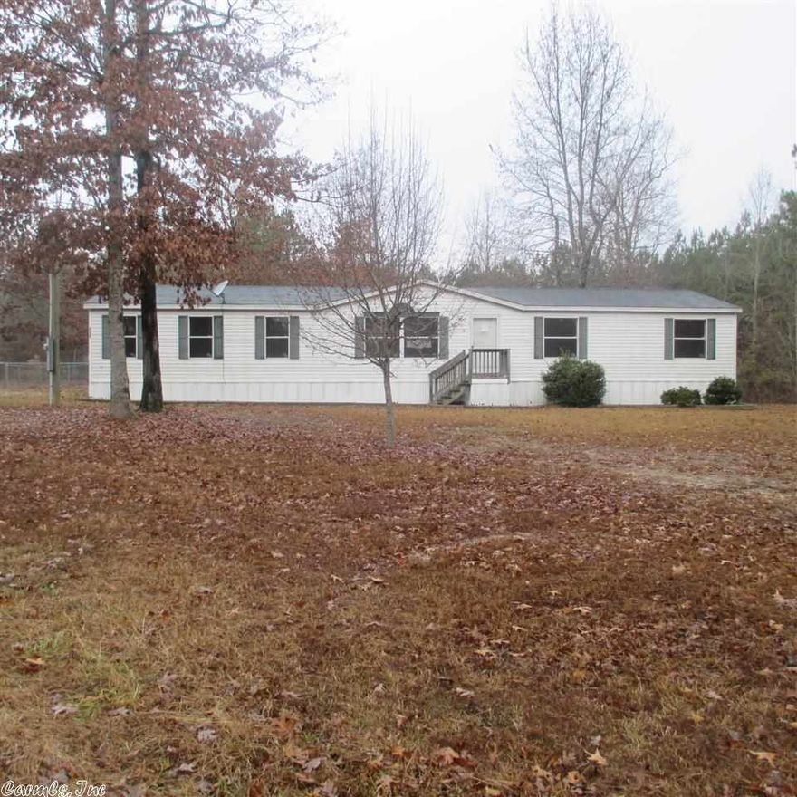 Double wide on approximately 3 acres.  3 bedrooms and 2 baths, make up this split floor plan.  This is country living at its best, this home is situated between White Hall and Little Rock.  **Agents see remarks**