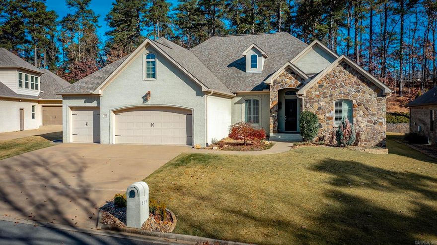 Located in the highly desirable Miramar Place in Chenal Valley, this stunning custom-built home offers luxury, space, and exceptional functionality. The open-concept layout is ideal for both everyday living and entertaining, flowing seamlessly to an expansive patio with a wood burning fireplace. The primary suite is a true retreat, featuring dual vanities, a soaking tub, and large walk-in shower. The split floor plan provides two additional bedrooms on the main level, a formal dining room and an additional room for an office, playroom or guest room. The kitchen is appointed with an abundance of cabinetry, multiple seating options with island counter seating and separate bar seating, plus a large eat in area.  Upstairs is a versatile fourth bedroom with on suite bathroom that can also serve as a flex room or home office. The spacious oversized three-car garage includes additional under stair storage. Recently updated with a new roof. Ideally located, this home offers the perfect blend of luxury, comfort, and convenience.