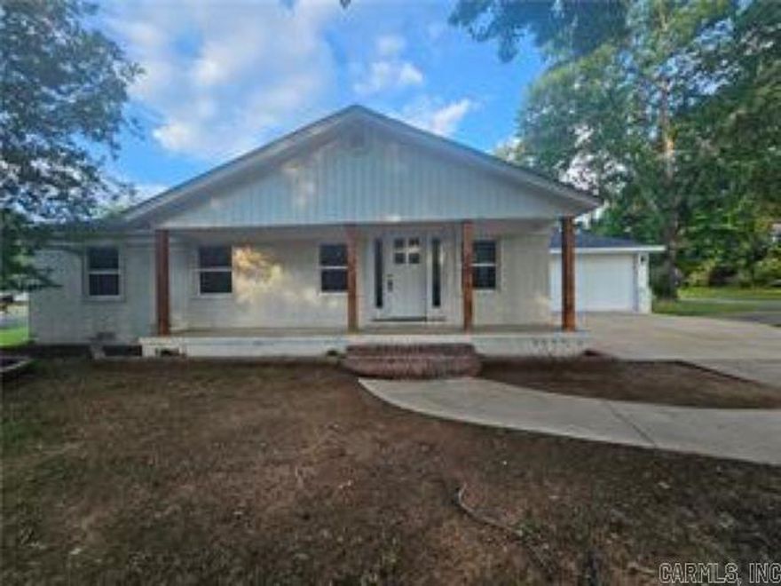 This beautifully remodeled home, updated less than three years ago, features 3 spacious bedrooms and 2 well-appointed bathrooms. The generous living room flows seamlessly into the eat-in kitchen, offering plenty of space to add a formal dining area. The kitchen is a chef's dream, with sleek granite countertops and island, a gas range, and a large deep sink. The master bedroom boasts dual closets and a luxurious en-suite with separate his-and-her sinks, a walk-in shower, and a soaking tub for ultimate relaxation. For added peace of mind, the home also includes a 192 sq ft basement or tornado shelter, built on a solid concrete slab, providing a safe and secure space for your family. Outside, the backyard provides ample space for relaxation or for pets to roam freely. The oversized garage comfortably fits two cars and still leaves room for extra storage. Additionally, there's a convenient outdoor storage to keep all your backyard tools and equipment neatly tucked away.