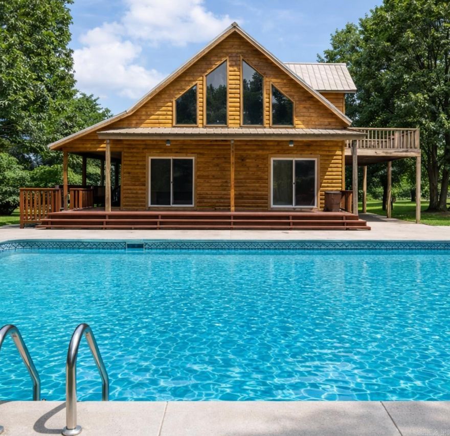 Tucked away on 9.33 private acres just 30 minutes from Greers Ferry Lake, this 4-bedroom retreat offers the kind of space most buyers are searching for but rarely find under $400k.  The property is designed for living outdoors as much as indoors — featuring an in-ground pool, basketball court, sweeping views and room to spread out without sacrificing convenience.  Built in 2011, the home provides modern comfort with a functional layout ideal for families, remote work or weekend escapes. Whether you’re hosting gatherings, raising a family with room to roam, or simply enjoying quiet mornings away from the noise, this property delivers lifestyle flexibility.  If you’ve been looking for acreage near the lake without lakefront pricing, this is the opportunity.