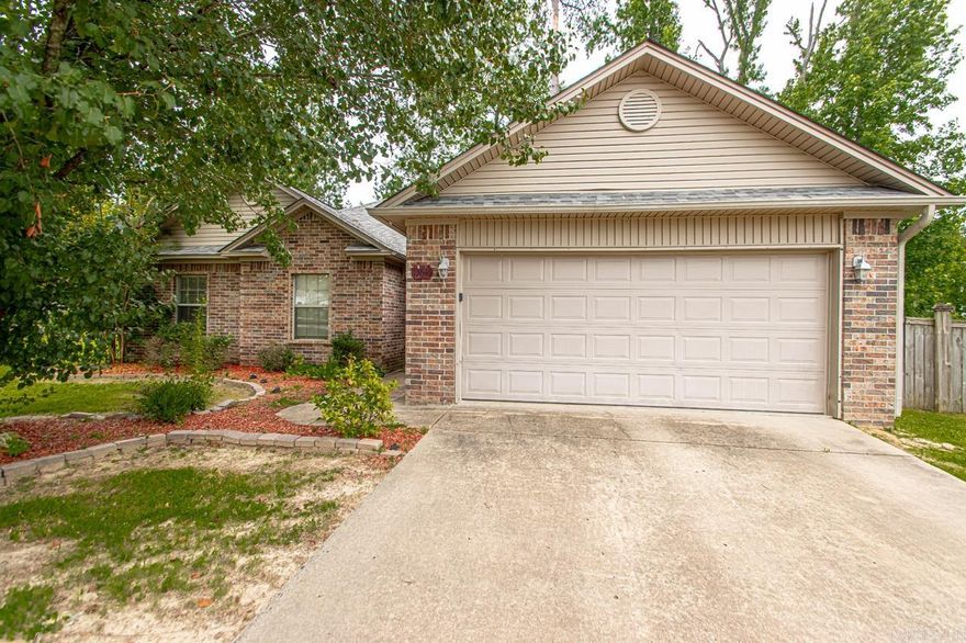 Welcome home! Beautiful 3 bed 2 bath brick home. Large living room with tray ceiling and a fireplace. Open kitchen with updated appliances and a dining area. Large master bedroom with tray ceilings. Master bath features jack and jill style sink, jetted tub, shower, and his/her closets. Fenced in backyard with covered patio and storage building. This home is move in ready, schedule your showing today!