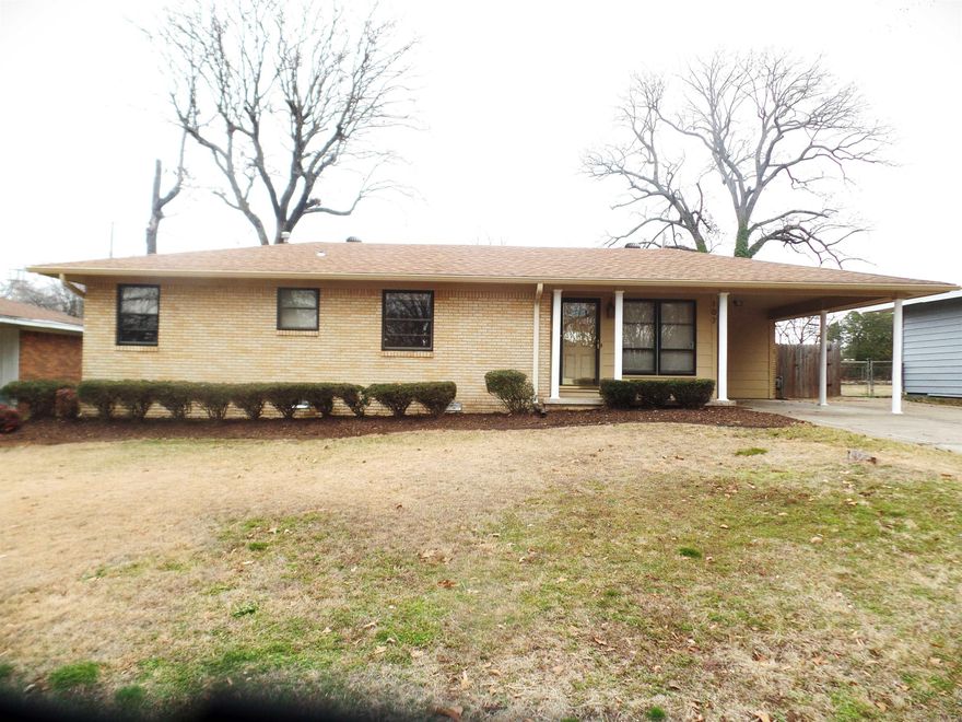 Updated 3BR 1.5 BA Brick Home on a large (.24 acres) lot with fenced backyard with plenty of room and covered patio in nice quiet neighborhood--New paint and trim throughout--Crown molding--Updated Bath--Dishwasher--Washer + Dryer included--Hardwood Floors in Family Room and Hallway--Master BR and BA--Updated Landscaping--Kitchen is fully furnished with Lots of Cabinet space--Refrigerator Included--Food Freezer--Outside Storage