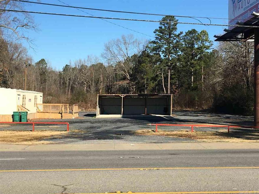 1 Acre Appx. Gravel Lot - With Appx 400 SQ ft Office - Would be great for Car Lot, Tractor Sales, Landscaping Sales, Rock Yard, Etc. - Over 22,000 Cars Per Day. Great Location.