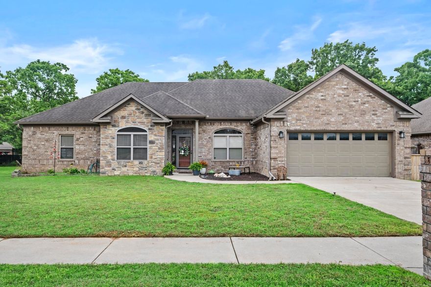 Such a great family home in a quiet, gated community! Step inside & you will find a space for everyone! A designated office, w/hand scraped hardwood floors, is the perfect place for those who work from home. The living room is large & has a fireplace w/gas logs. Step into the kitchen & marvel at the abundant counter space. The beautiful wood cabinetry gives a warm homey vibe. The kitchen also boasts an eat in area & breakfast bar w/room for 4 bar stools. There is also an attached formal dining room. 3 guest rooms are situated apart from the primary suite & have luxury vinyl plank flooring. One of the guest rooms has a built in desk & walk in closet. Another of the guest rooms has 2 closets. There is a conveniently located hall bathroom w/tub/shower combo & vanity w/granite counter. Across the home, you will find a spacious primary suite. The ensuite bath includes a whirlpool tub, oversized shower, 2 walk in closets, & double sinks.In addition to the 2 full bathrooms, there is a half bath. The all brick exterior is low maintenance & includes gutters. The fully fenced, backyard is large & level. Your family will love the covered area along w/the pergola & outdoor kitchen. See remarks