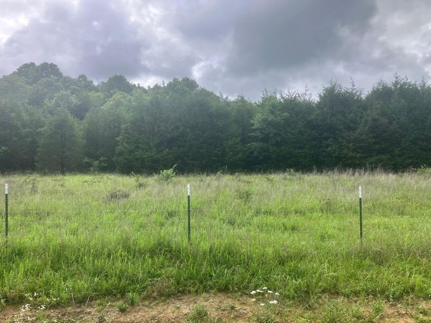 Ready-to-use recreational paradise or future homesite! Nestled in the heart of Fulton County, this acreage offers the perfect blend of hunting woods and some open pasture. Whether you are looking for a weekend getaway, a hunting camp, or the ideal spot to build your dream home, this property is completely set up and ready to enjoy from day one. All the heavy lifting is already done for you: the property features rural water, electricity hook up, and septic system for a travel trailer. Peace of mind is built right in with an existing storm shelter on the property. Properties with this level of infrastructure and versatility don't stay on the market long. Don't wait-bring your camper, your side-by-side, and your hunting gear, and start enjoying the quiet country life today! Camper, pop-up trailer, and personal tools do not convey with the property.