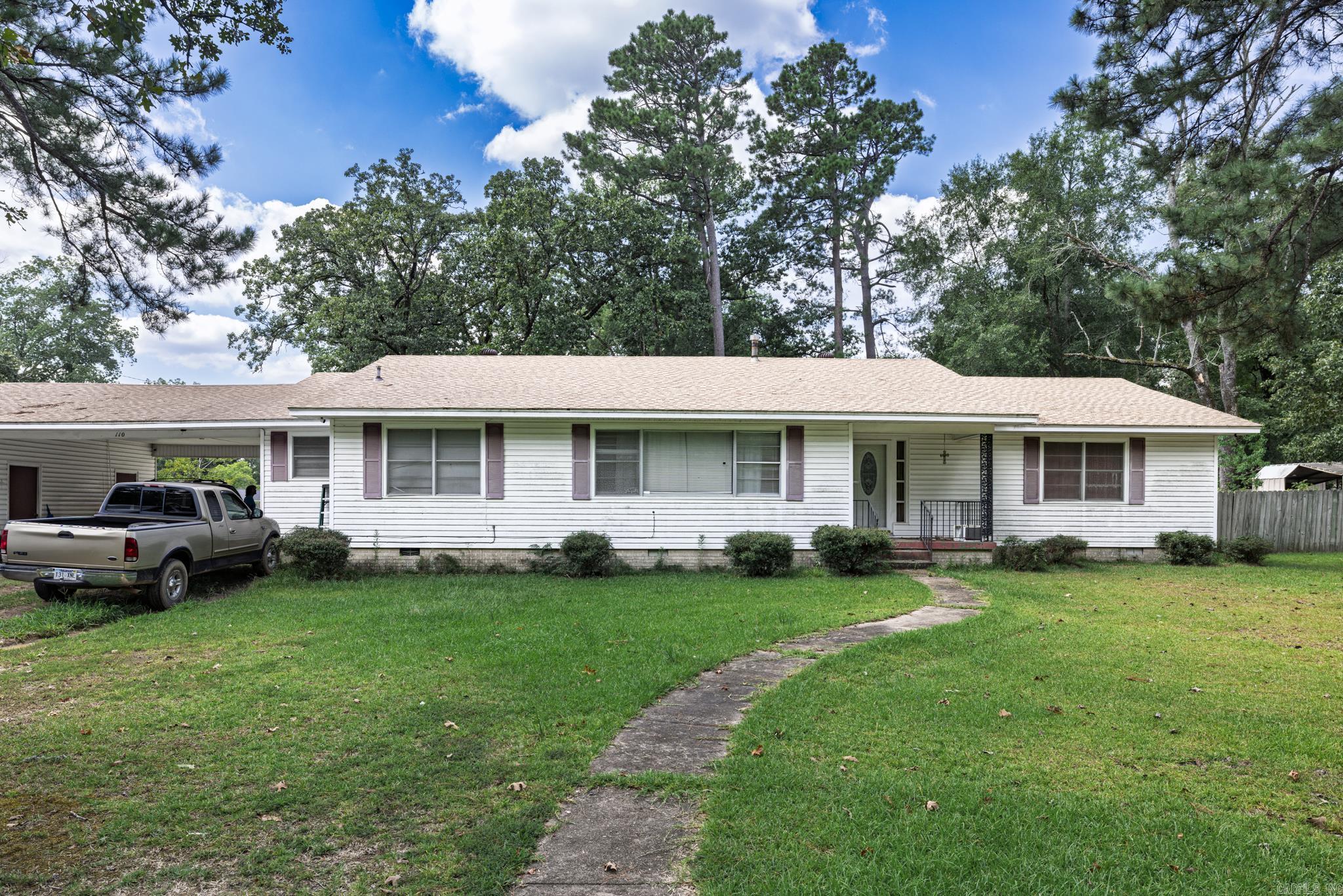 This three-bedroom, two-bath home in Gurdon, Arkansas sits on an oversized lot and offers plenty of space both inside and out. The property features a spacious fenced-in backyard, perfect for outdoor activities, pets, or gardening. Inside, youāll find multiple living areas including a comfortable living room, a cozy den, a formal dining room, and an eat-in kitchen, providing options for both everyday living and entertaining. With tons of potential for updates, this home is a wonderful opportunity to add your personal touch and make it your own.