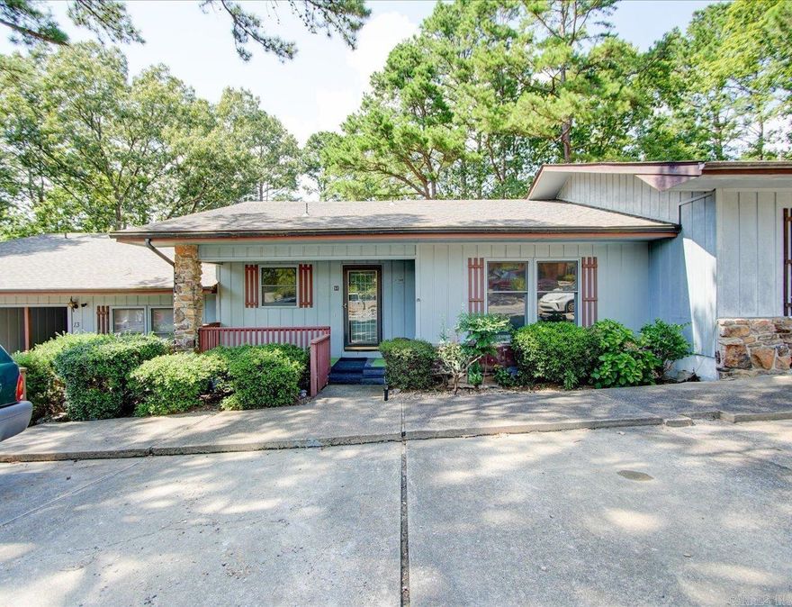 Home Sweet Townhome in on the West side of Hot Springs Village.  Well-maintained one-story features an open floor plan with living, dining, and kitchen areas.  Two roomy bedrooms with double closets and 2 partially updated bathrooms.  Features include new floors in the living/dining/kitchen areas, and carpet in the bedrooms.  Subdivision adjoins Lake DeSoto.  Fresh paint, flooring and new carpet  This home is move-in ready and located in a nice area that allows STR.