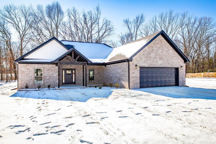 Beautiful new construction home in Hidden Valley Estates! Hardwood look tile, granite/quartz countertops, TONS of custom cabinets in this one, custom trim, laundry room connects to master closet, custom tiled shower with custom glass door, large pantry, huge master closet & large his and her vanities in master with linen cabinet, stand along soaker tub, fireplace, large covered back porch, soffit/eave can lights, oversized garage and tons more. Purchase now and customize your selections today! Photos are of model home.