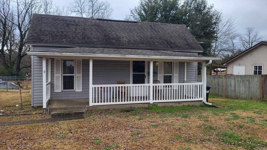 Cute little cottage, all ready for you to move into!  New carpet, new washer & dryer, new beds, day bed in living room.  Fenced yard and 2 storage buildings!  This house is located conveniently near downtown, Janssen Park, convenience store, library and more. Has a 1 car carport, built to match the home and situated outside the fence.  Come take a look!  You need an appointment, and home will qualify for any type of government loan.