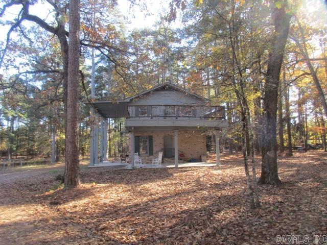 Beautiful, secluded property located in Cleveland County. Large 2-story lodge style house, downstairs is a large open area for gatherings, upstairs is the large open sleeping area. Swimming pool, large pond/lake, outbuildings. The Traveler Railroad car is a historic attraction that could be used for events, weddings, photo shoots, etc. .Built in the early 1900's, it has 2 sleeping quarters and a seating area, elegant wood trimmed throughout. All of this is located on a 36 acre tract of land. Gated entrance for security. This is a very special property just waiting on the right person to take over. Perspective buyers must provide proof of funds or be approved for a conventional loan before showings.