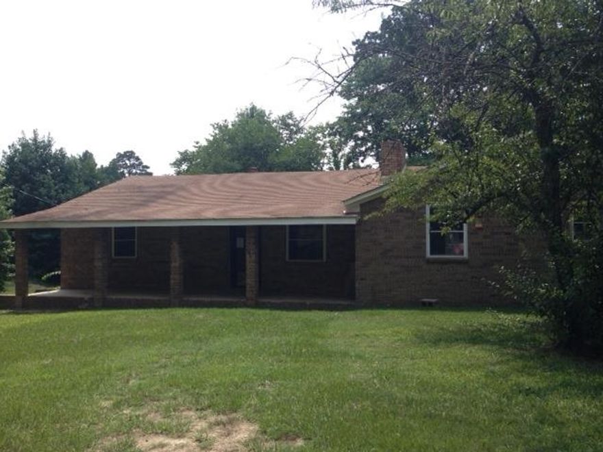 Corporate owned property in Glenrose School District.  Brick home needs some improvements, but appears to have good bones! Roof was updated.  Large master bedroom is apart from other two.  40 x 42  Metal shop building.  Agents - please see confidential remarks for information you will need.